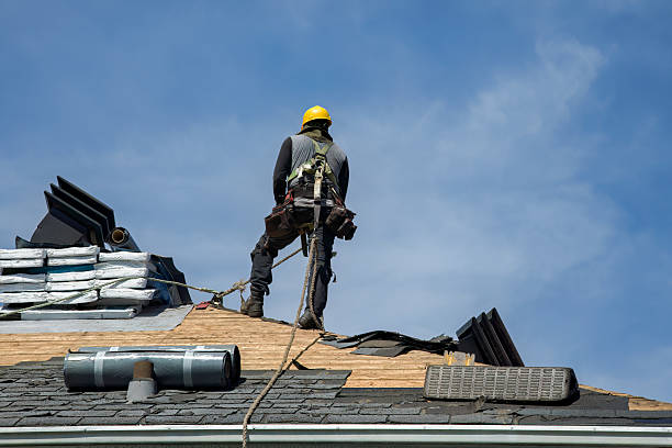 Professional Roofing technician working in Quogue, NY